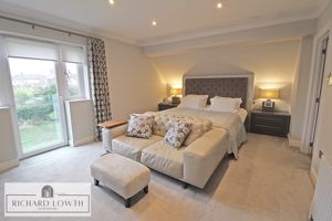 Bedroom One- click for photo gallery